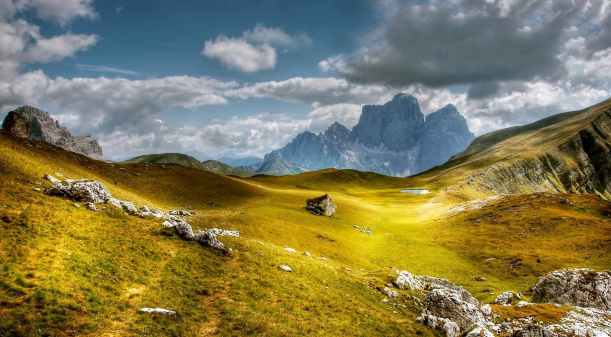 alpine clouds daylight grass